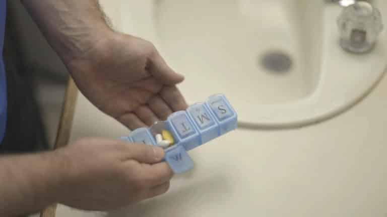 person-taking-pills-alt-content